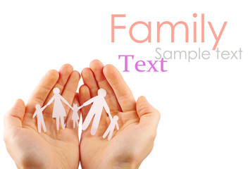 Paper family in hands isolated on white background