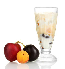 Milkshake with fruit isolated on white close-up
