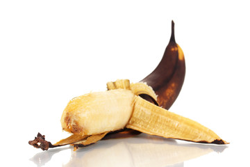 Naklejka premium spoiled banana isolated on white
