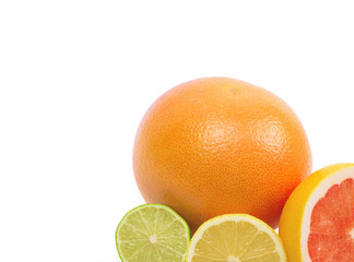 Image of a fresh whole lime, lemon and orange isolated on white