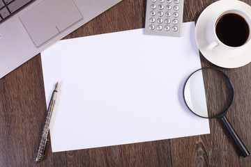 Business papers and a cup of coffee