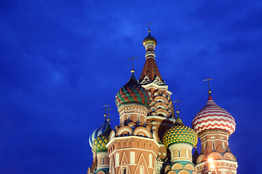 Domes of St. Basils cathedral on Red Square at night in Moscow,
