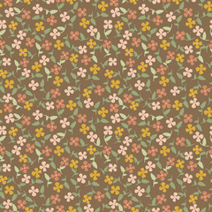 Seamless pattern with small cute flowers on dark background