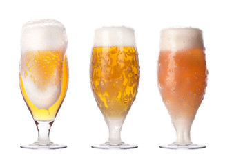 Frosty fresh beer set with foam isolated