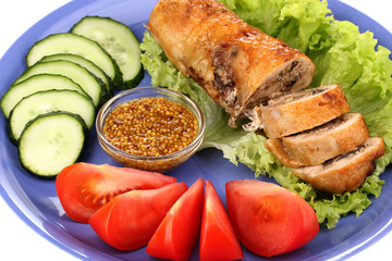 Tasty meat cutlet with garnish on plate close-up