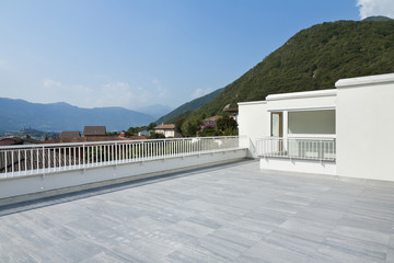 large terrace of a modern white house