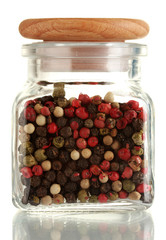 jar with pepper isolated on white