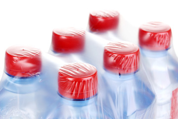 plastic bottles of water isolated on white