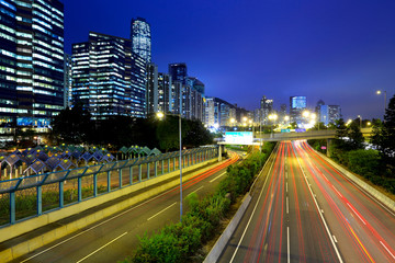 Fototapeta na wymiar city in night with busy traffic