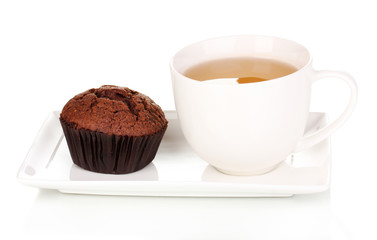 Fresh muffin with tea isolated on white