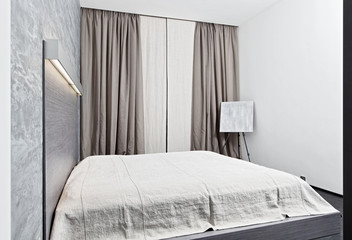 Modern minimalism style bedroom interior in monochrome tones