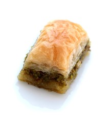 Turkish baklava with pistachio on white background