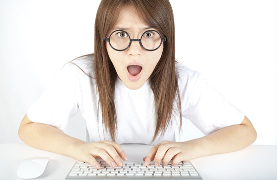 Teenage girl angry at computer
