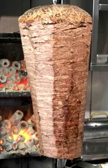 Gordijnen Turkish doner kebab with real coal fire. © Hayati Kayhan