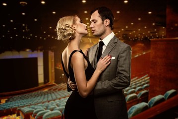 Couple in theatre interior