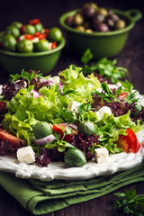 Mediterranean-style salad with feta and green olives