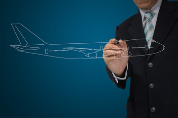 Business Male Hand drawing airplane