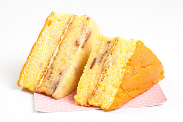 2 peice of yellow cake on a white background