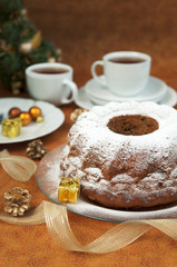 Christmas table setting - cake and christmas decorations