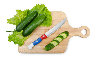 Tomatoes and cucumbers on white