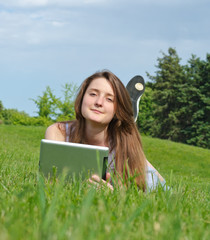 Relaxed woman using a tablet