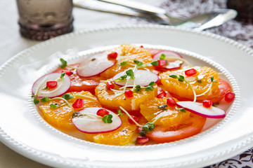 Orange,Pomegranate and tomato salad