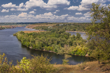 Fototapeta premium Summer landscape with river and cloudy sky