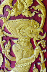 Fototapeta premium Thai stye carving texture in temples wall