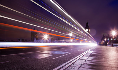 Fototapeta na wymiar Traffic over the Westminster Bridge blurred by long exposure