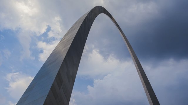 Timelapse St. Louis Arch with dramatic clouds in the background
