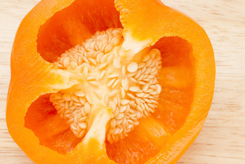 Close up image of half an orange pepper