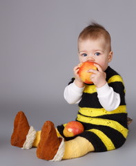 Little baby with apples