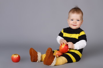 Little baby with apples