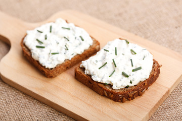 Two slices of spicy buttered bread
