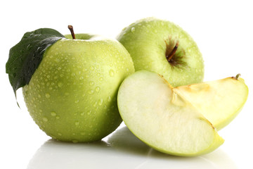 Ripe green apples with leaf and slice, isolated on white