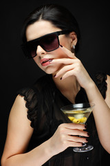 beautiful young girl  with  glass of martini