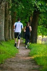 Fototapeta premium Young couple jogging