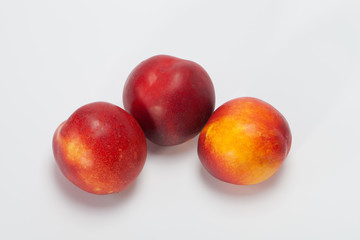 Fresh Peaches isolated on white
