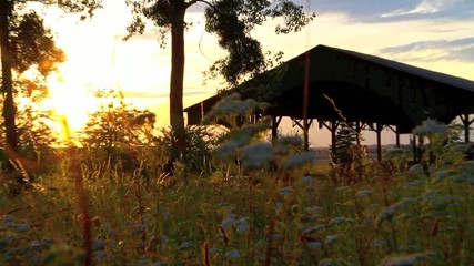 Colorful sunset over an old barn