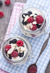 Milk and cream summer dessert with almonds