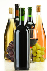 Obraz premium Composition bottles of wine of different sort