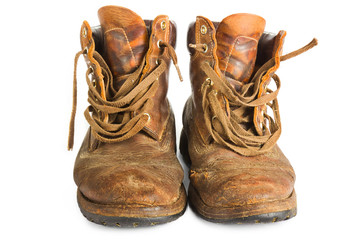 Pair of brown leather work boots on white