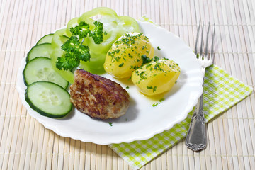 Boiled potatoes with hamburger and vegetables