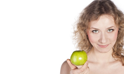 Fototapeta na wymiar Smiling attractive woman offers a green apple, isolated
