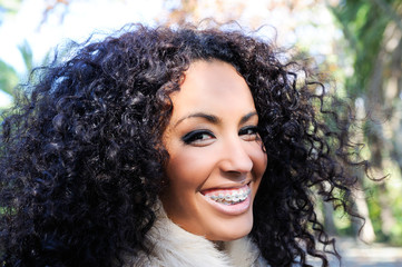 Happy black girl with braces
