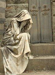 grief, tombstone on monumental cemetery in Florence, Italy, Euro