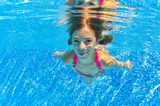 Happy underwater child in swimming pool,kids sport