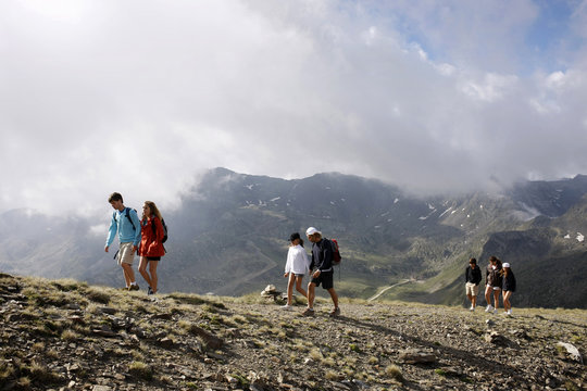 Family And Friends Hiking In The Pyrenees