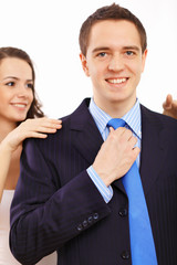 Businessman dressing at home in the morning