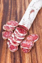 salami sausage on wooden background